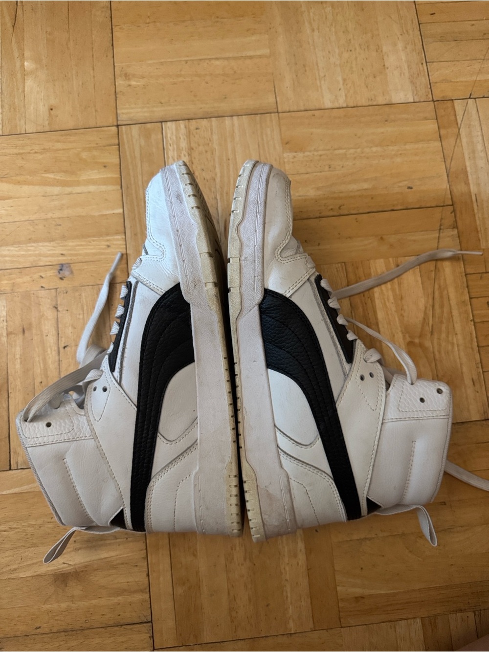 Puma White and Black High-Top Sneakers